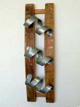 Spiral wall-mounted wine rack